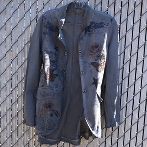Light grey jacket with stamped pattern
